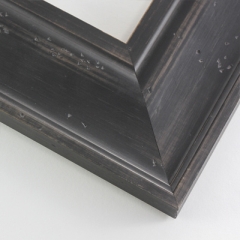 This natural-wash wood frame features a black varnish that does not disguise the rich wood grain.  Antiquing is created by nicks that add character and depth to the subtlety bevelled face.

3 " width: ideal for large or oversize images.  Border a rustic greyscale or nature photograph, or autumnal painting or print with this simple, bucolic frame.