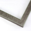 Slightly angled 1-1/4 " frame with an indented design on the inner and outer edge. The face is metallic silver stain brushed over a dark grey base. The accented inner and outer edge reveal a mint green patina which highlights the difference in texture.