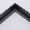 This simple, tapered edge canvas floater frame features a narrow face with a drop edge that widens internally toward the base.  This style, in a classic matte black, lends a unique hovering effect to your framed canvas. 

Display your favourite gallery wrapped Giclée print or painting with authentic, fine art style. These slender canvas floating frames are ideal for smaller, .75 " deep (thin) stretched canvases.

*Note: These solid wood, custom canvas floaters are for stretched canvas prints and paintings, and raised wood panels.