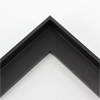 This small, L-shaped floating canvas frame in matte black features a simple flat face.

*Note: These solid wood, custom canvas floaters are for stretched canvas prints and paintings, and raised wood panels.