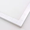 This high shine, silver foil frame features a flat, slim profile.  A brushed finish reveals subtle lines and faint black spattering gives an antique look.  The final effect is simple, yet glamorous.

1 " width: ideal for small- to medium-size images.  Suited to oil or watercolour paintings, prints, and abstract or nature photographs.